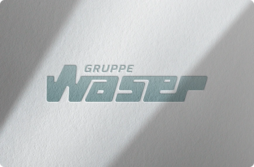 Logo der "Gruppe Waser" in grauer Schrift auf hellem Hintergrund.