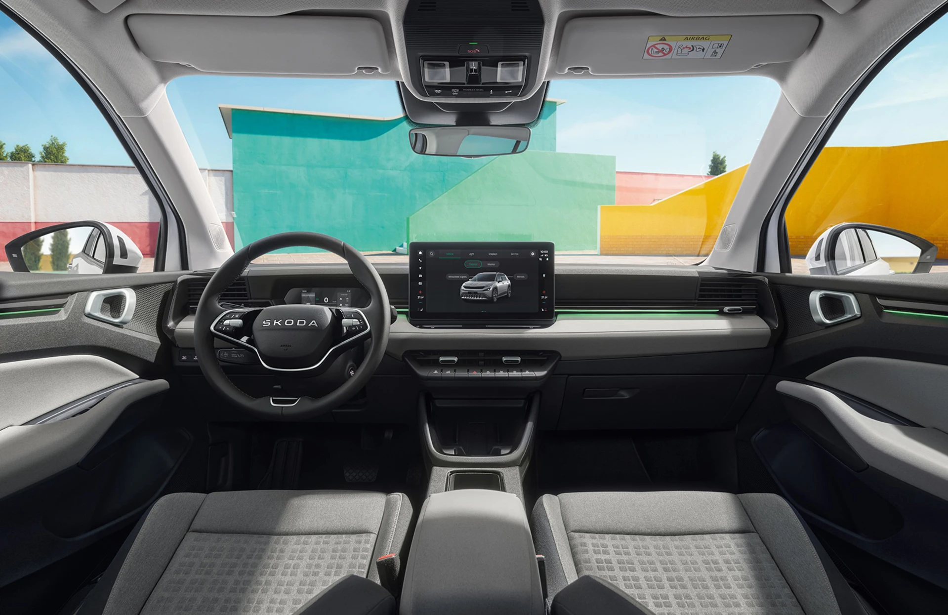 Innenansicht des Skoda Epiq mit Lenkrad und Touchscreen-Display.